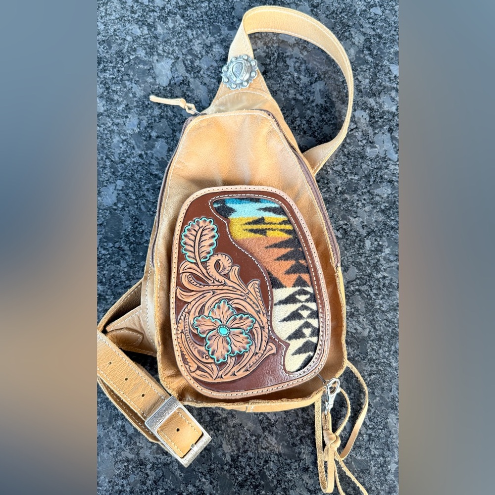W Brand Designs handmade tooled leather sling bag